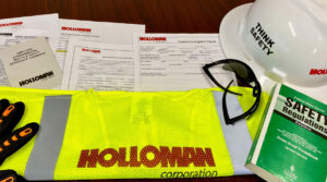 Safety documents with gloves and hard hat